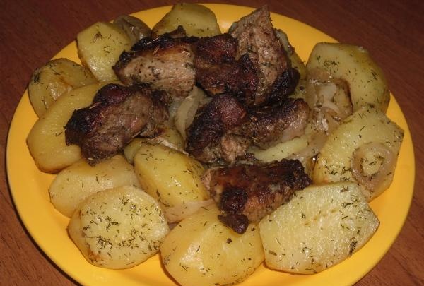 Baked potatoes with meat in the sleeve