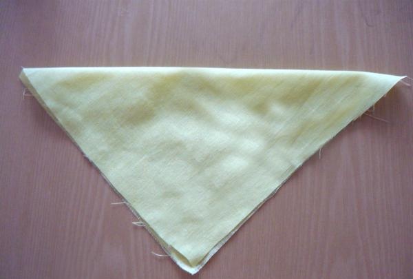 Fold the fabric diagonally