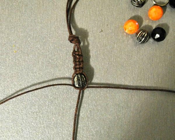 the first bead on the middle cord