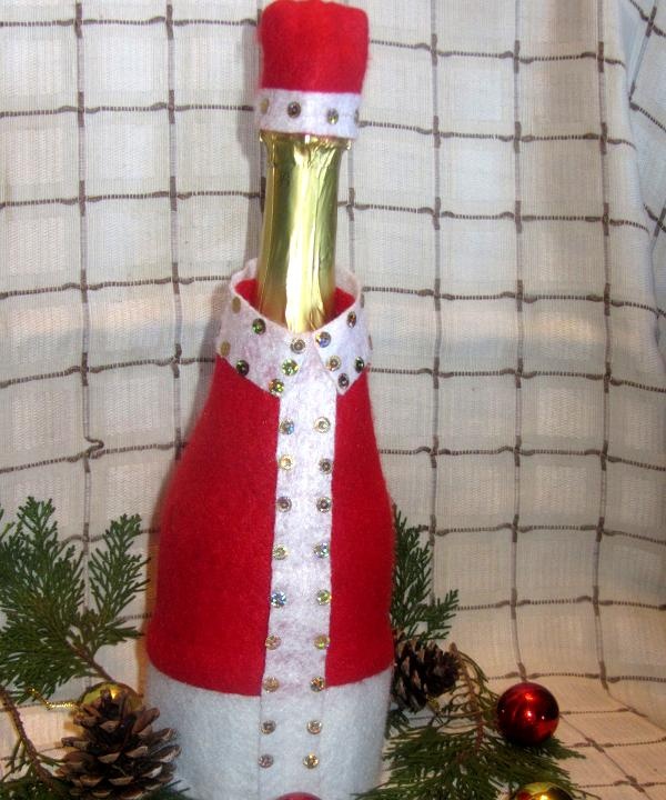 Kalėdų Senelis ant šampano butelio