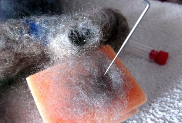 form a felted patch