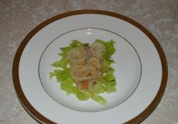 Pollock fillet with onion and sour cream