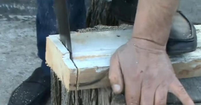 Uma maneira rápida de afiar uma serra manual com um moedor
