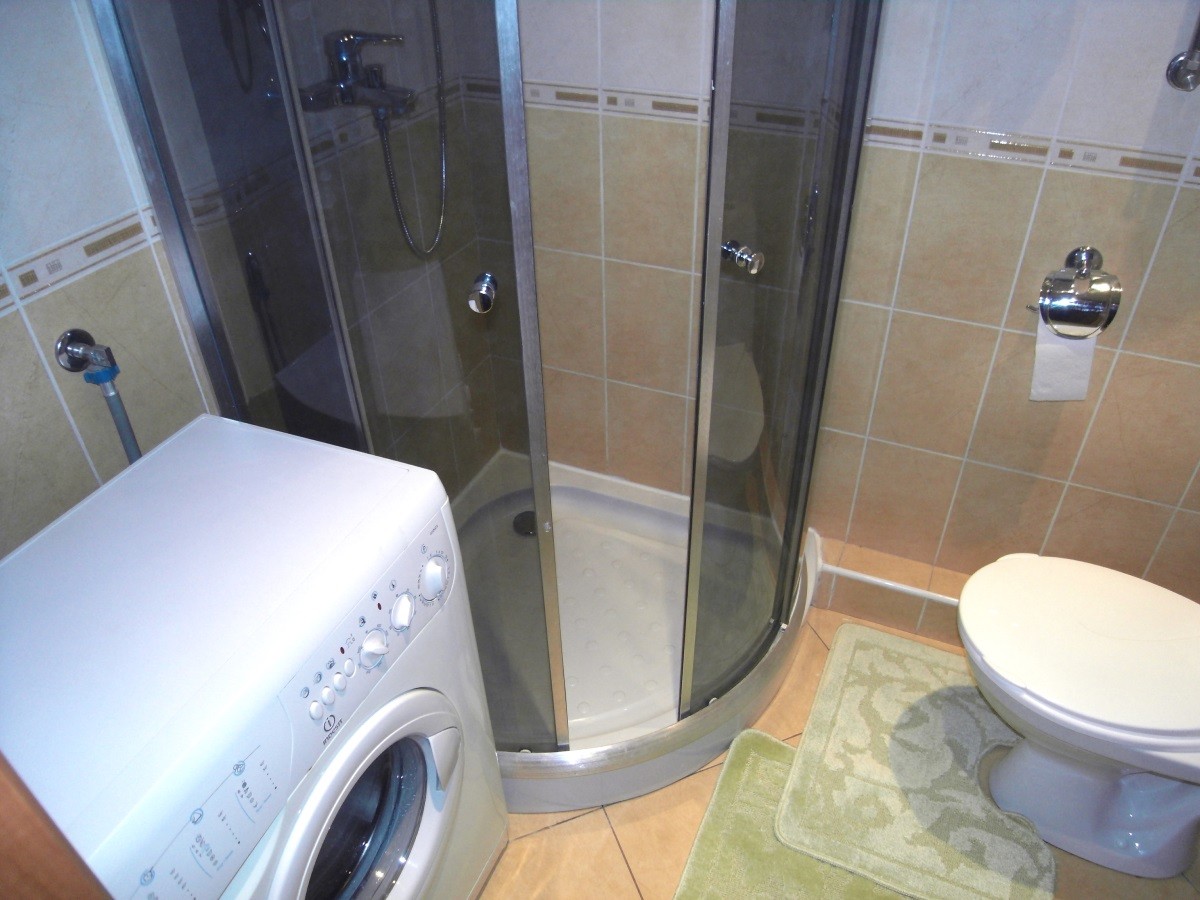 Tvättmaskin i ett litet badrum - designfunktioner