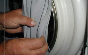 How to remove the cuff of the hatch of the washing machine