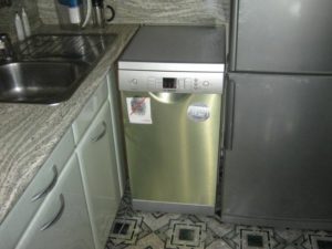 Can I put a dishwasher next to the refrigerator?