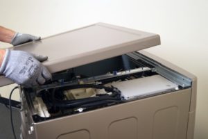 How to remove the lid from the LG washing machine