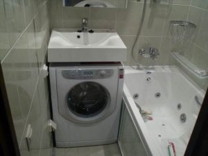 Where to put the washing machine in a small bathroom