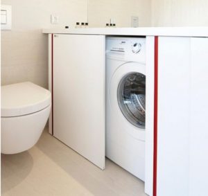 Hogyan lehet elrejteni a mosógépet a fürdőszobában?